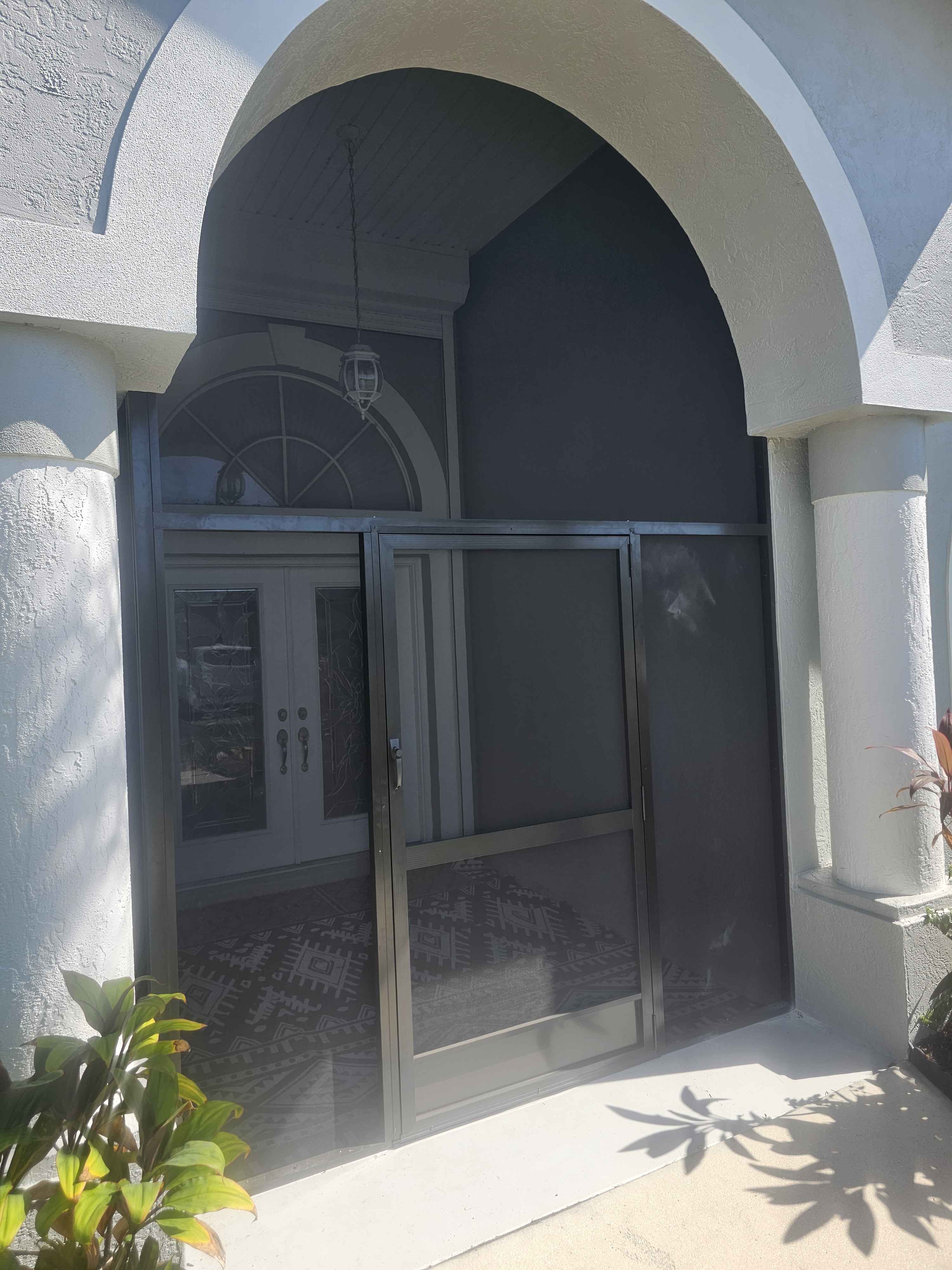 Screen enclosure repair on Sarasota home entryway